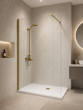 Walk-in shower door with clear glass and matt gold frame